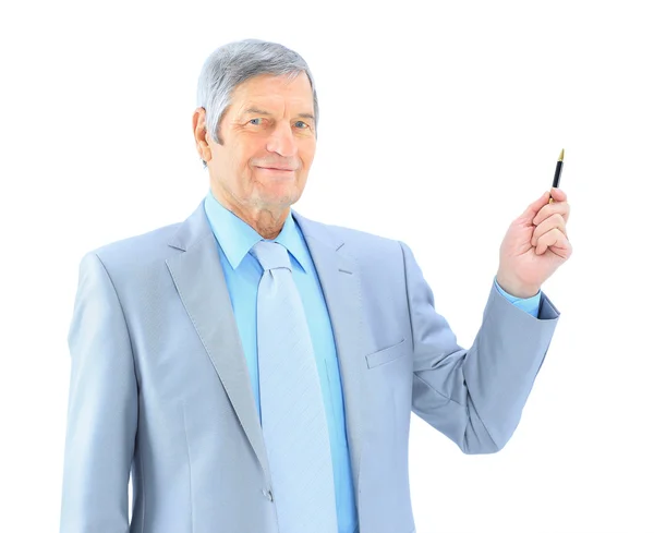 Businessman in age, writes in the air. Isolated on a white background. Stock Image
