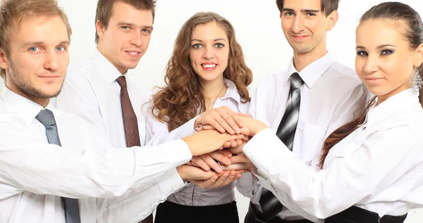 Business team putting their hands on top of each other — Stock Photo, Image