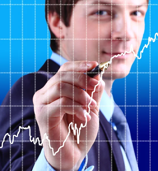 Business man hand drawing a graph — Stock Photo, Image