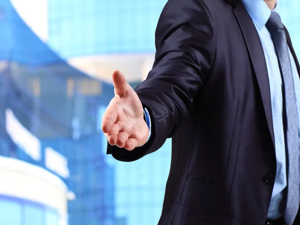 A business man with an open hand ready to seal a deal — Stock Photo, Image
