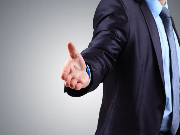 A business man with an open hand ready to seal a deal — Stock Photo, Image