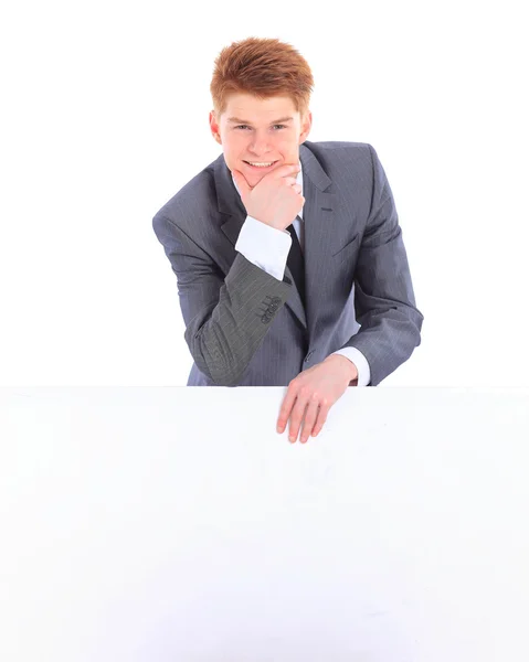 El joven hombre de negocios guapo aislado sobre un fondo blanco . — Foto de Stock