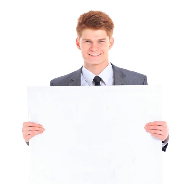 El joven hombre de negocios guapo aislado sobre un fondo blanco . — Foto de Stock