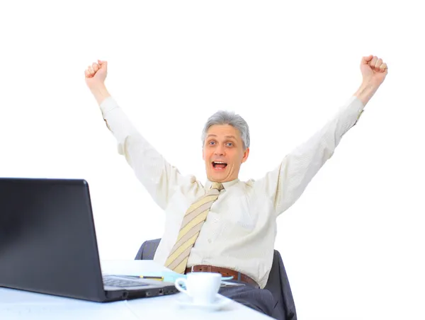 The businessman at the age of works for the laptop. Isolated on a white background. — Stock Photo, Image