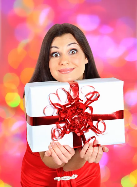 Beautiful girl with gifts. — Stock Photo, Image