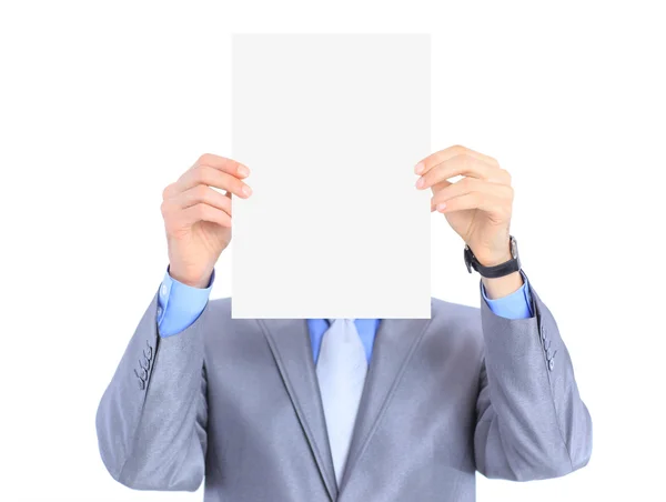 Nice businessman holds white poster. Isolated on a white background. — Stock Photo, Image