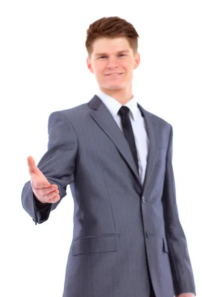 Confident business man giving you a hand shake on white backgrou — Stock Photo, Image