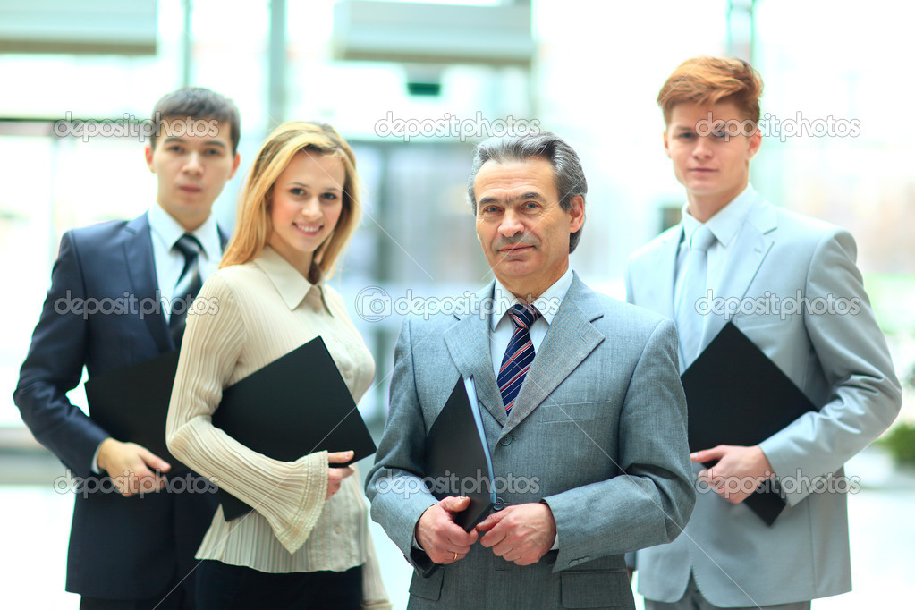 Group of business with businessman leader on foreground