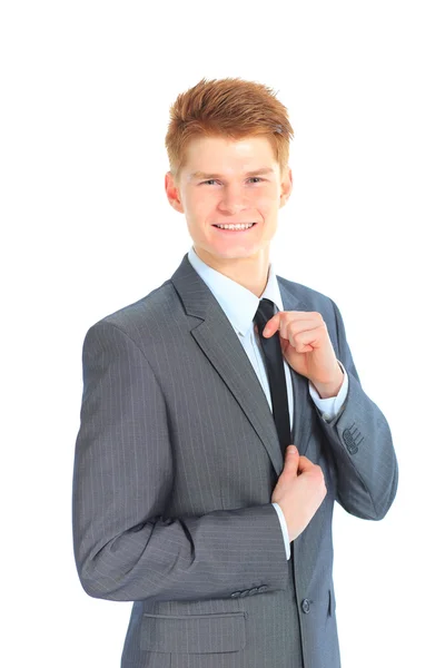 O jovem empresário bonito isolado em um fundo branco . — Fotografia de Stock