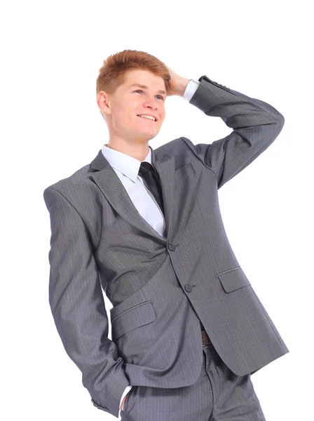 El joven hombre de negocios guapo aislado sobre un fondo blanco . — Foto de Stock