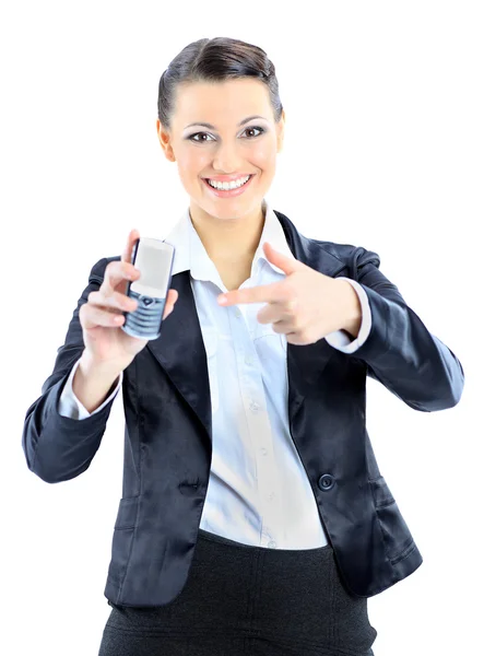 Mooie zakenvrouw verwijst naar de telefoon. geïsoleerd op een witte achtergrond — Stockfoto