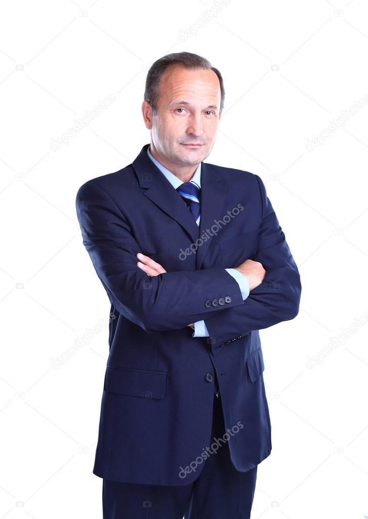 Portrait of an old businessman in suit with crossed arms isolated in a white background