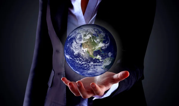Business hand holding globe(Collage images from www.nasa.gov) — Stock Photo, Image