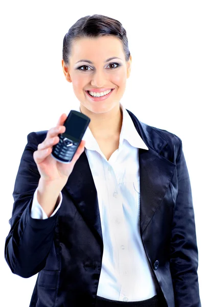 Mooie zakenvrouw verwijst naar de telefoon. geïsoleerd op een witte achtergrond. — Stockfoto