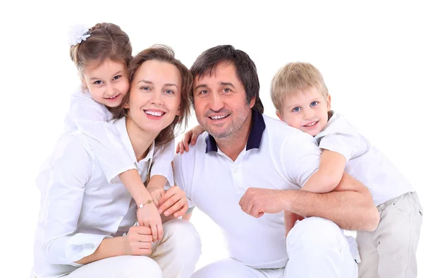 Bella famiglia felice isolato su un bianco — Foto Stock