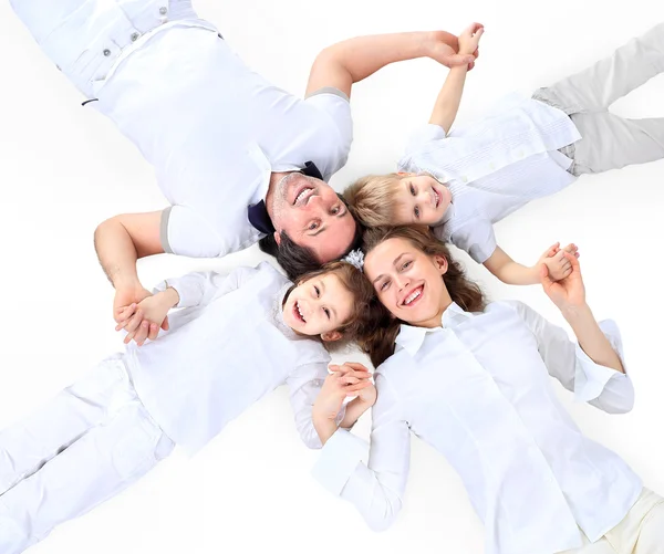 Bela família feliz - isolado sobre um fundo branco — Fotografia de Stock