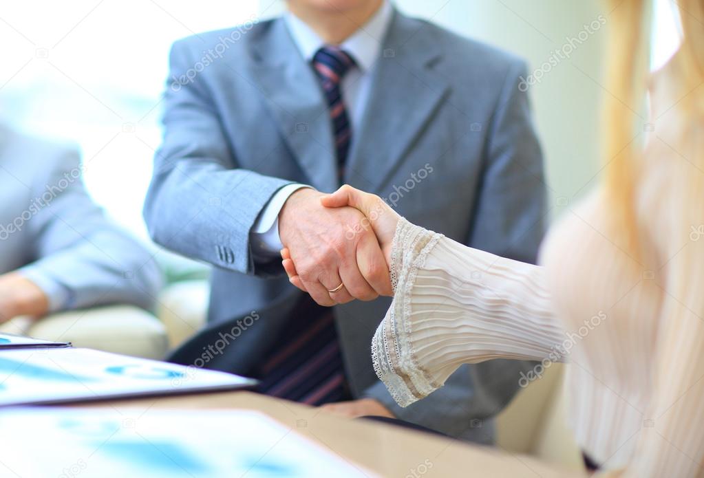 Business people shaking hands