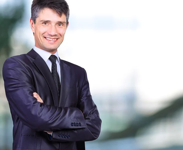 Portret van een lachende knappe zakenman — Stockfoto