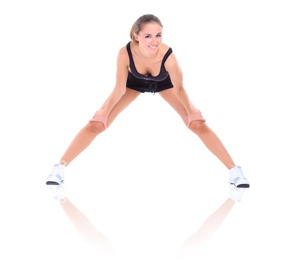 Pretty brunette in black active wear on white background — Stock Photo, Image