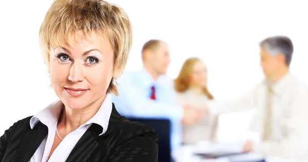 Successful business woman looking confident and smiling — Stock Photo, Image