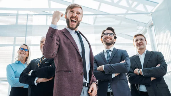 Very happy young businessman showing his success — Stock Photo, Image