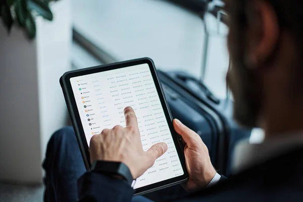 Tablet computer in the hands of a business man .close-up. Royalty Free Stock Photos