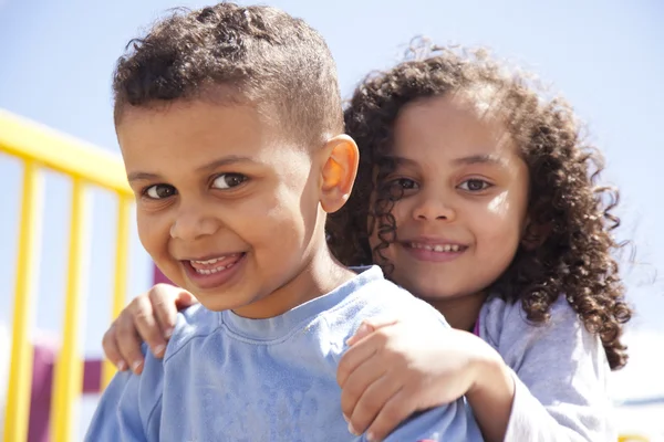 Bother and sister hugging — Stock Photo, Image