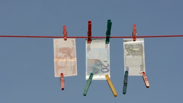 Currency euro on clothes-line after money-laundering — Stockvideo