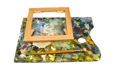 Painters palette with brush and canvas frame on white clipart