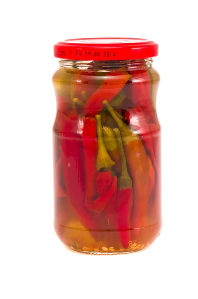 Pickled peppers in glass jar isolated on white — Stock Photo, Image