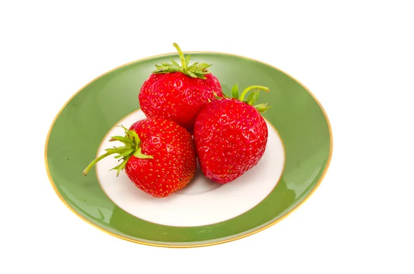 Strawberries on the green plate — Stock Photo, Image