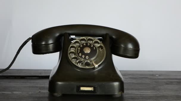 Gangster hand with black glove calling telephone — Stock Video © alisbalb2 #19083187