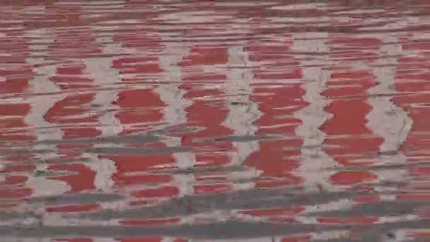 Colorful boat reflections on Ganges river, India — Stock Video