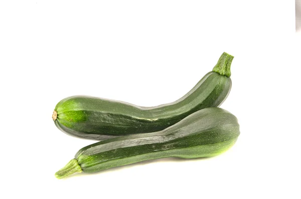 Två gröna zucchini isolerad på vit — Stockfoto