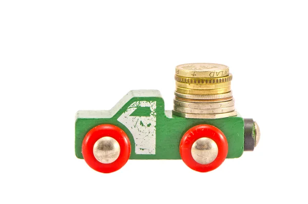 Vintage wodoen truck toy und money coins concept — Stockfoto