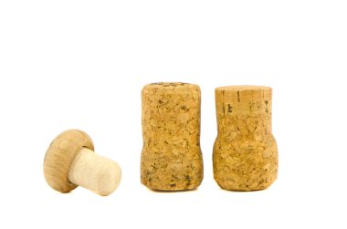 three cork stoppers isolated on white clipart