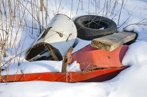 metal and rubber pollution on winter snow