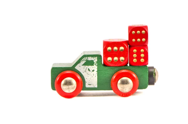 Old truck toy with three red dice isolated on white — Stock Photo, Image