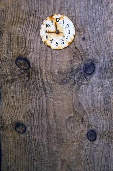 Old plank background with ancient clock face — Stok fotoğraf