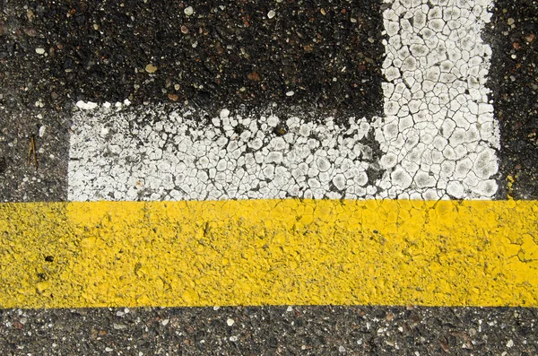 Asphalt background with white and yellow line — Stock Photo, Image