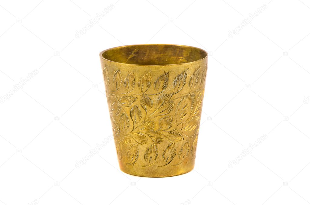ancient engrave brass cup isolated on white