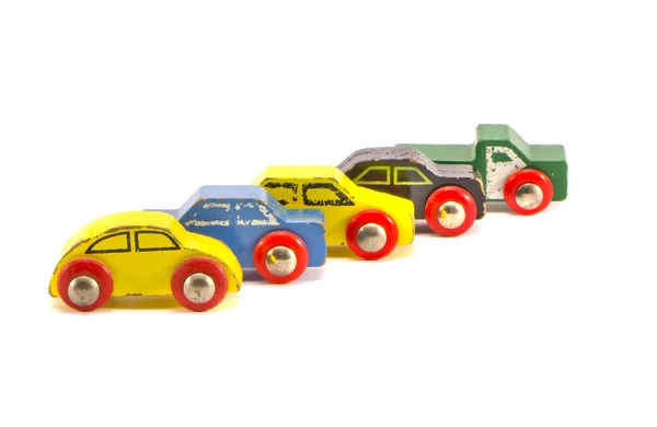 Cinco viejos coches de juguete retro aislados sobre fondo blanco —  Fotos de Stock