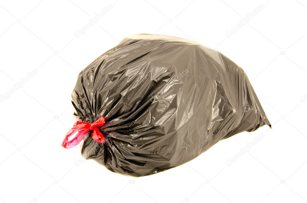 isolated full black garbage plastic bag in white background