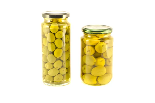 Green olives two glass jar isolated on white — Stock Image Green olives two glass jar isolated on white Royalty Free Stock Images