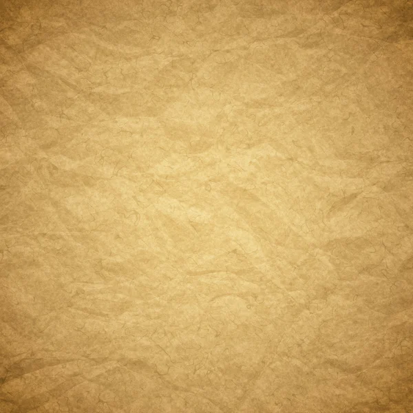 Textured obsolete crumpled packaging brown paper — Stock Photo, Image