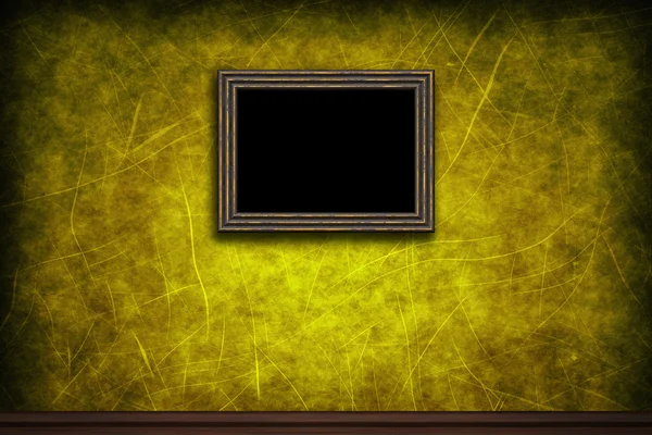 Oude houten frame op gele retro grunge muur — Stockfoto