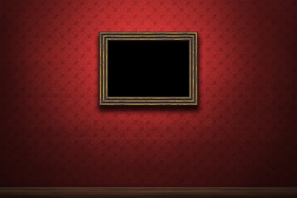 Old wooden frame on red retro grunge wall — Stock Photo, Image
