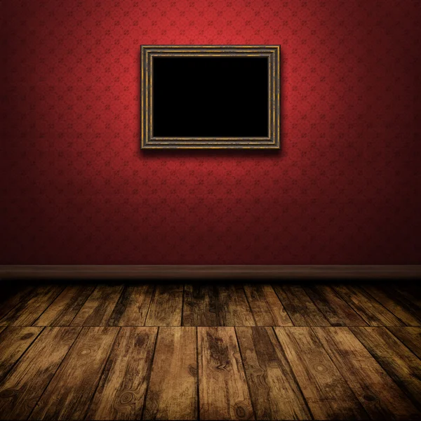 Chambre vintage sombre avec plancher en bois et vieux cadre sur le mur — Photo