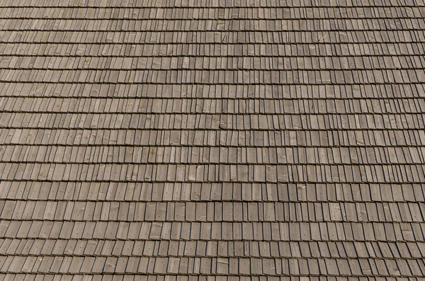 Real photo of wooden shingles on the roof — Stock Photo, Image