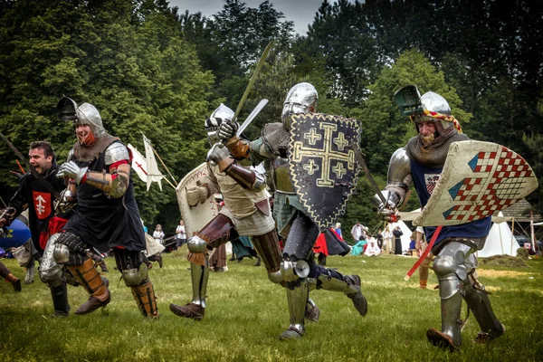 CHORZOW, POLAND, JUNE 9: Charge of the medieval knights during a — стоковое фото